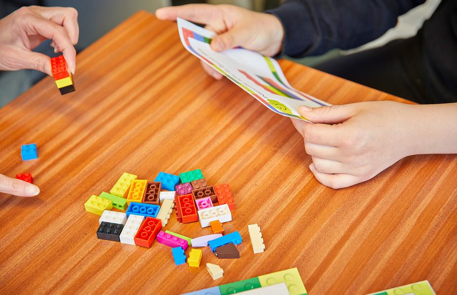 An exercise on the table using lego bricks