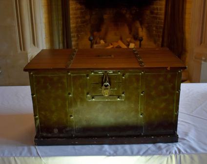 An old chest on a table.