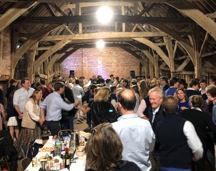 A barn full of people